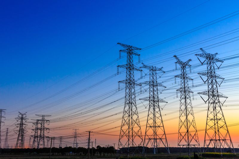 high voltage post,High voltage tower sky sunset background