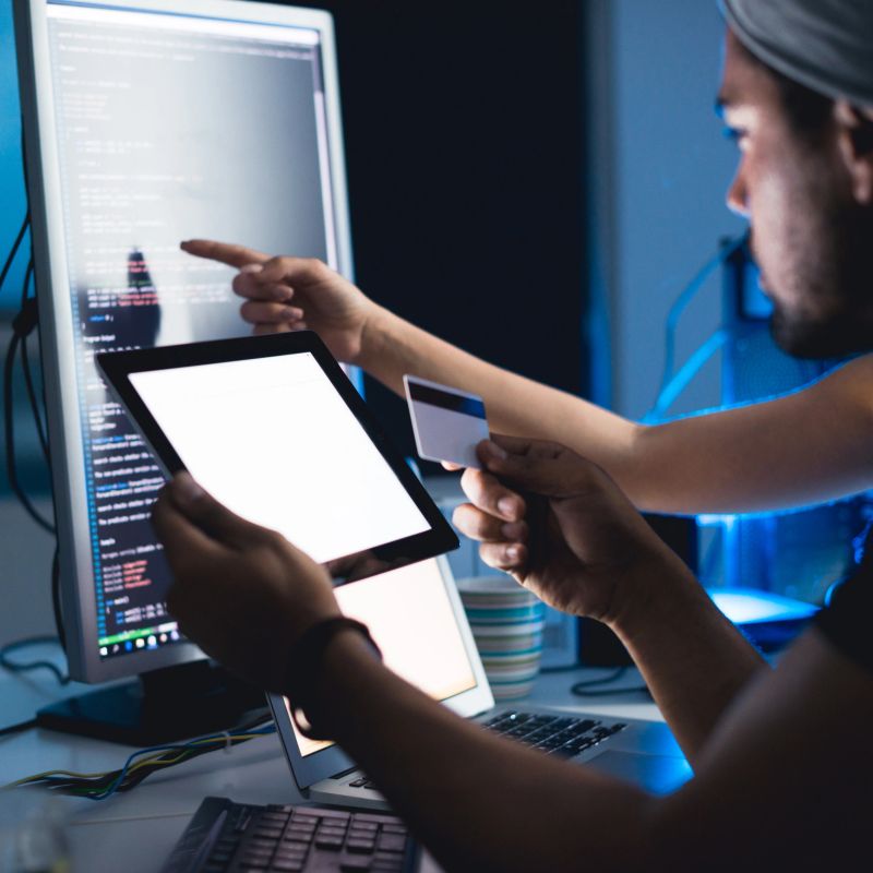 Cropped shot of two people working late at night.