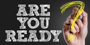 Hand drawing a yellow question mark next to text 'ARE YOU READY' on black background.