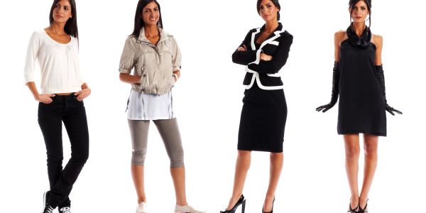 Four women wearing different stylish outfits.