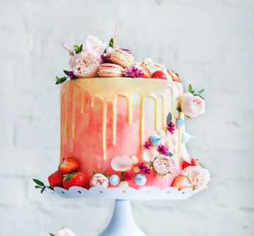 Two layered dessert cups with cream and crumb toppings.
