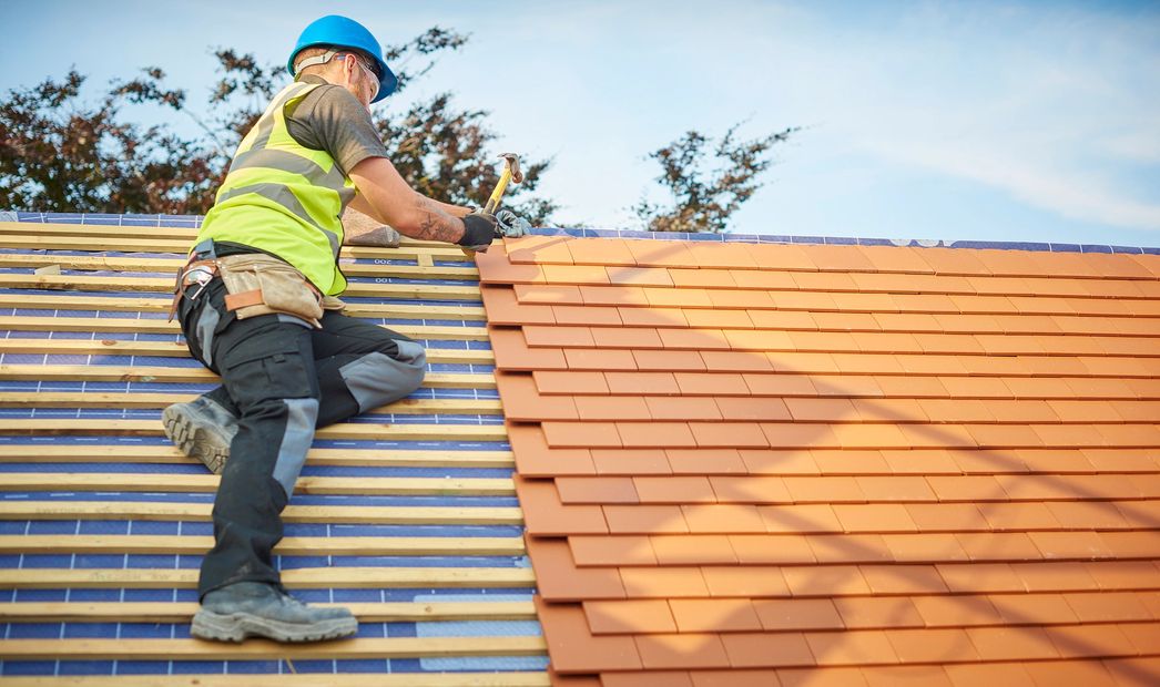 New roof installation on a suburban home.