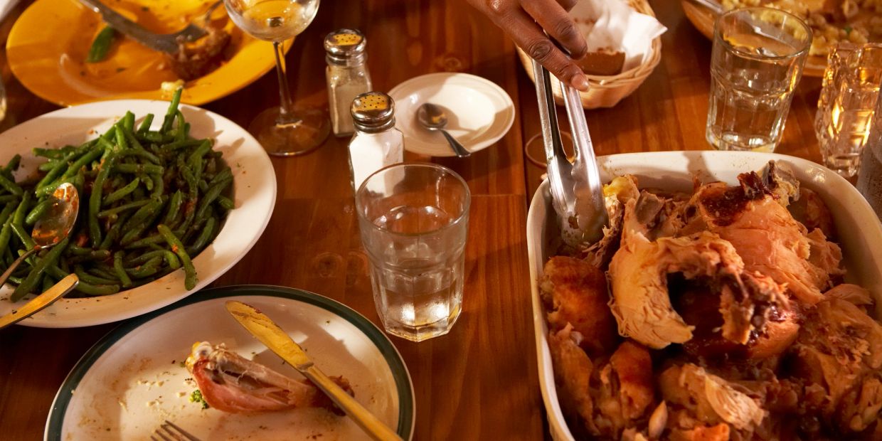 Family dinner with roasted chicken and green beans.