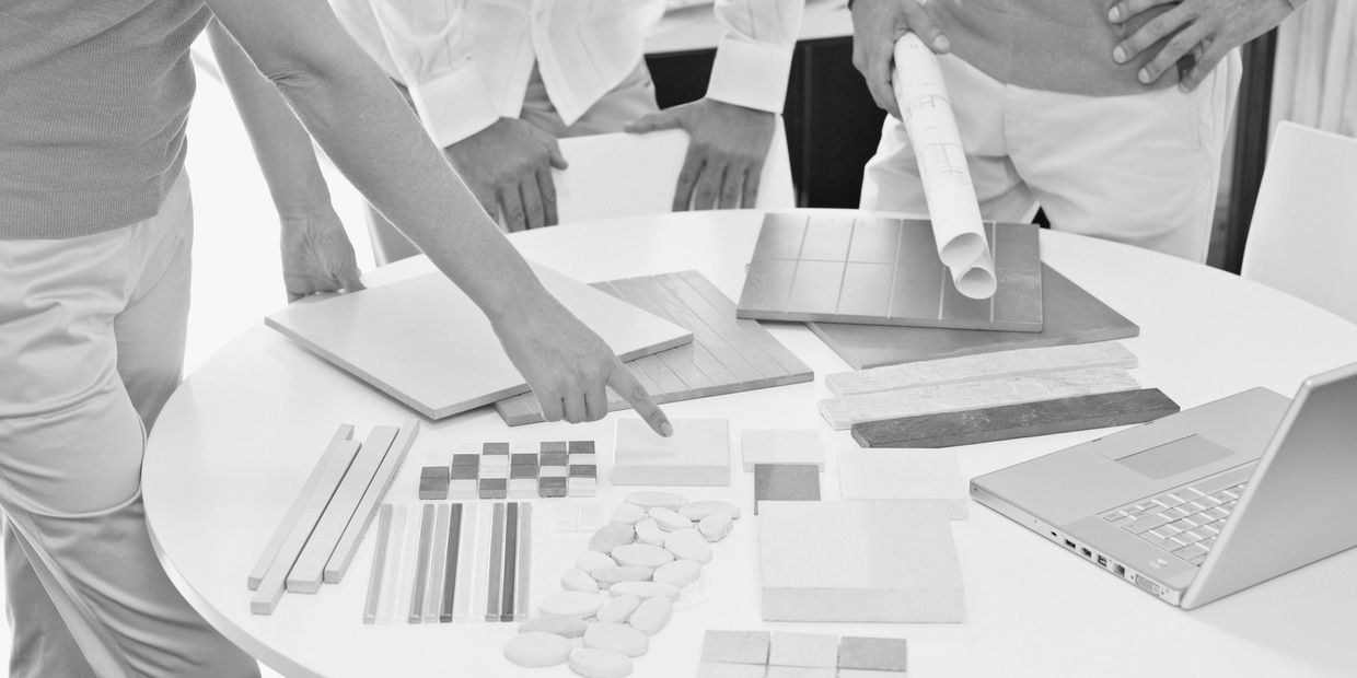 sandy-kastel-designs-teamwork-las-vegas-real-estate-owner's-rep-consultant-work-table-with-design-ma