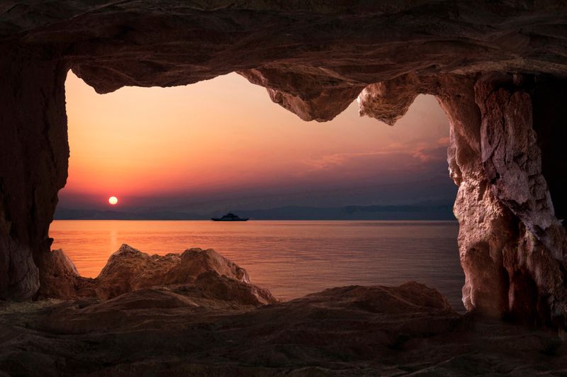 View of the sunset from the cave inside in Thasos, Greece.