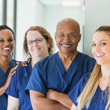 Experienced healthcare professionals standing together as a team.