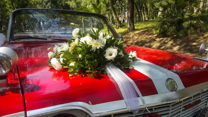 Wedding Bouquet On Vintage Car