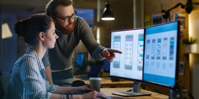 Two people collaborating on software design.