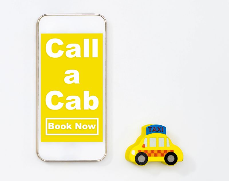 Use your Mobile to call up a taxi cap concept