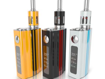 Three colorful vape devices in yellow, black, and white with digital displays.