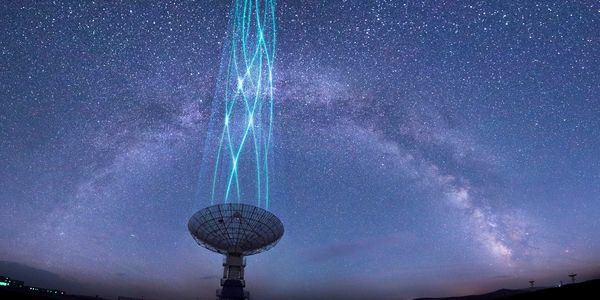 Radio telescope under a starry night sky with glowing blue beams.