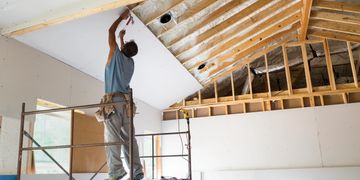 Hanging New Sheetrock.