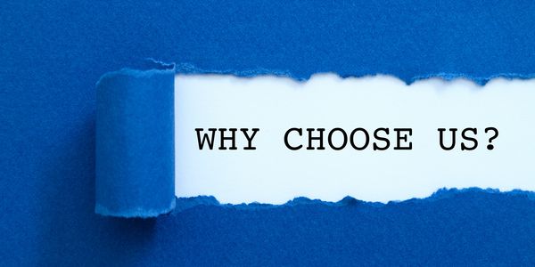 This image is a blue paper with a ripped area exposing the words 'Why Choose Us?'