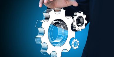 Businessman interacting with digital gears representing technology and innovation.