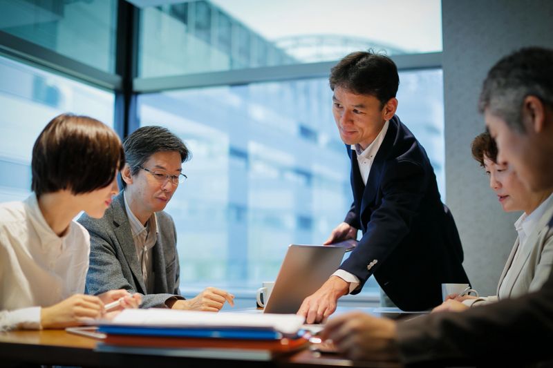 Businessman at a table having a meeting.