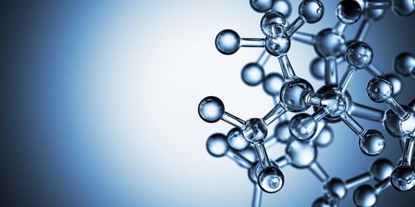 Close-up of a blue molecular structure model against a gradient background.