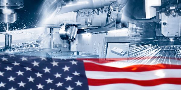 American flag overlaying advanced manufacturing machinery.