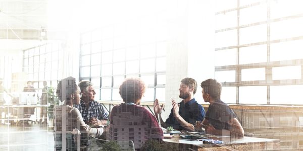 Team meeting in a bright modern office.