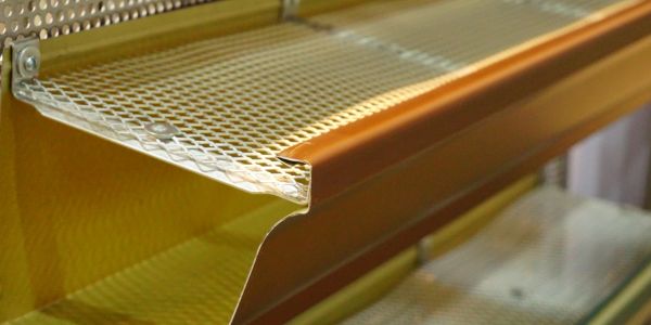 Close-up of a metal mesh shelf.