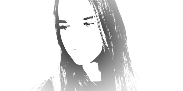 High-contrast black and white portrait of a pensive woman with long hair.