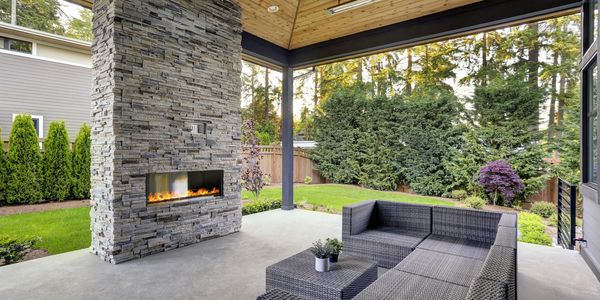 Electric fireplace located outside on back porch in Oklahoma
