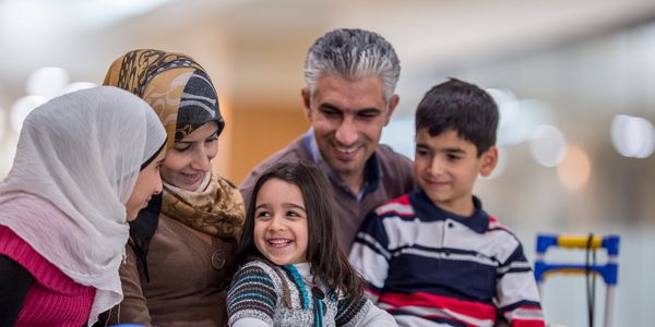 A happy family with smiling faces.
