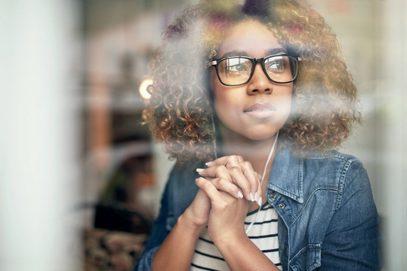 Shot of a woman in a cafe