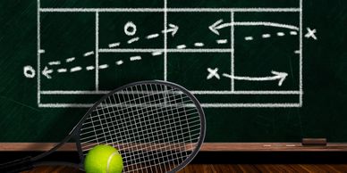 Tennis racket and ball in front of a chalkboard with a tennis strategy diagram.