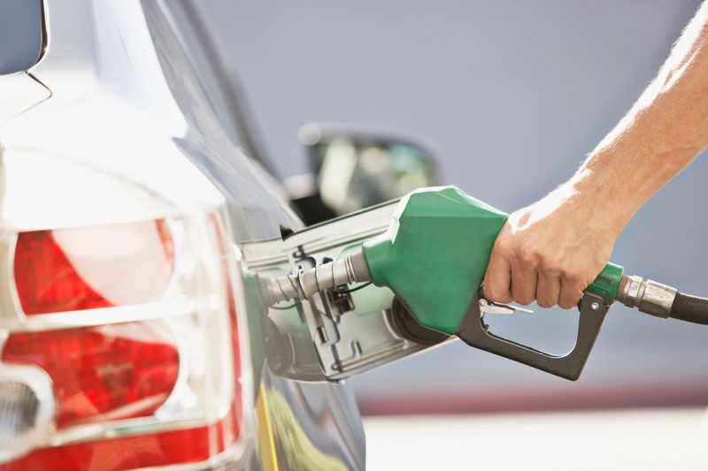 Man pumping gas