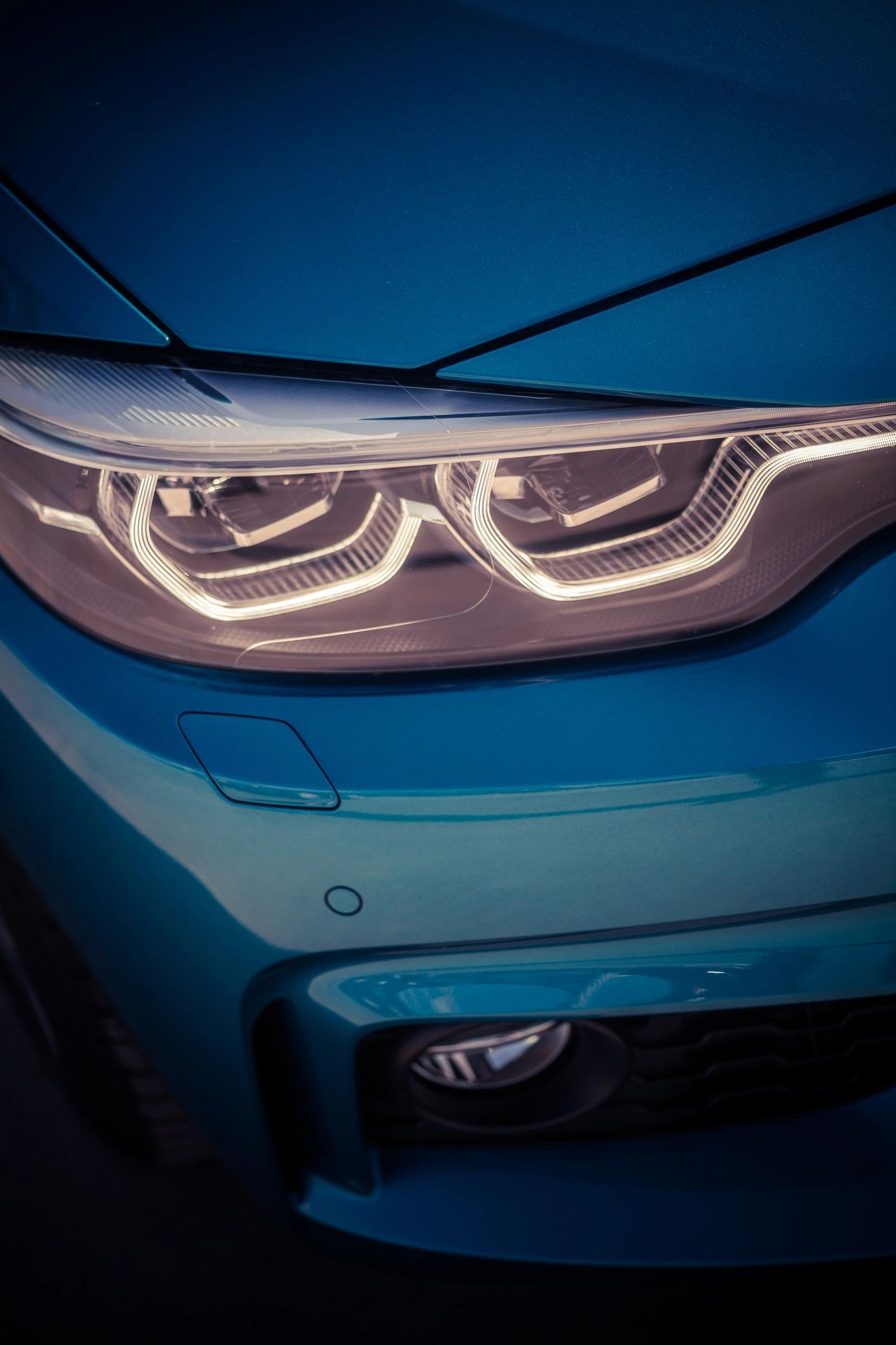 Close up shot of some LED automobile headlights.