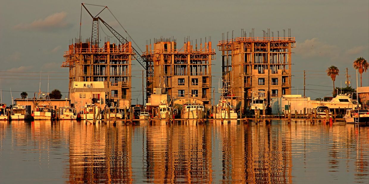 Marine construction workplace safety in Tampa with workers following jobsite safety procedures.