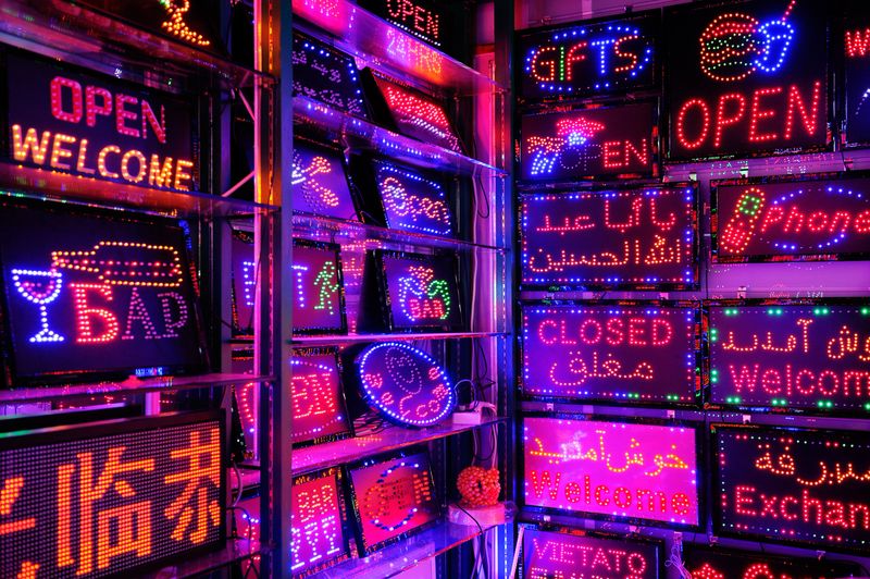 Huge variety of colorful neon and LED digital panels which can be used for advertisements or information. Sample texts displayed in different languages