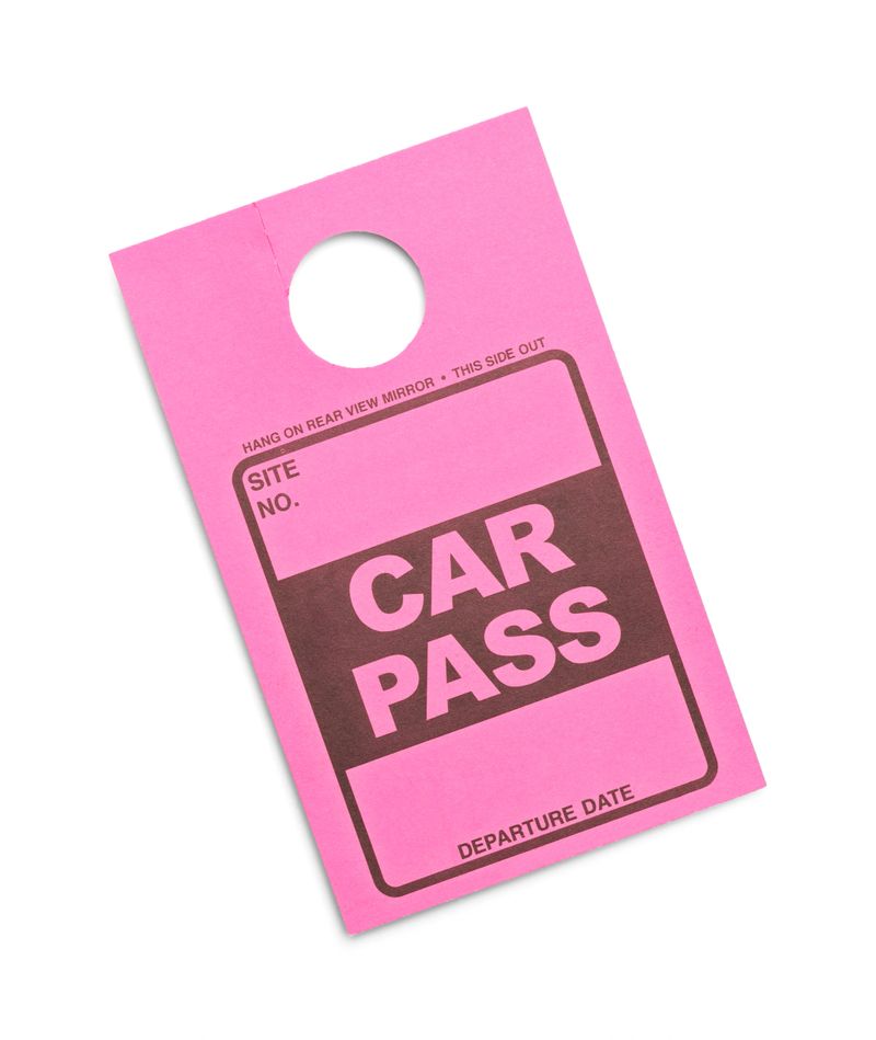 Pink Parking Permit Car Pass Isolated on White Background.
