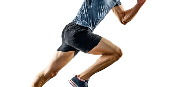 Athlete in mid-sprint, showing muscular legs and athletic wear.