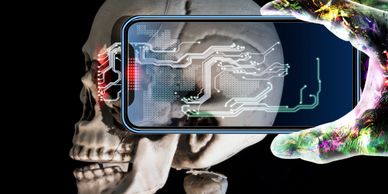 A digital scan of a skull through a smartphone held by a colorful hand.