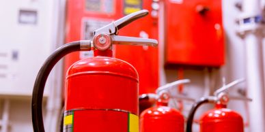 Close-up of a red fire extinguisher.