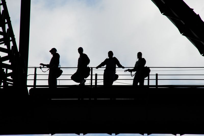Silhouette of tourists participating in the Sydney Harbor Bridge walk.  (April 2007)