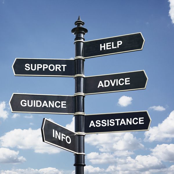 Directional signs pointing to help, support, advice, guidance, assistance, and information.