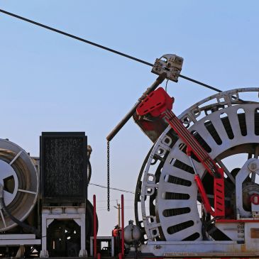 Large industrial machinery against a clear sky.