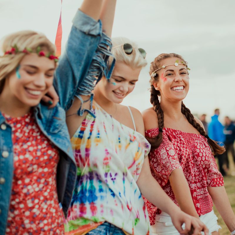 Group of friends enjoying a music festival.