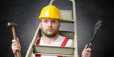 Unlicensed handyman with tools representing the risk of cheap masonry step repairs.