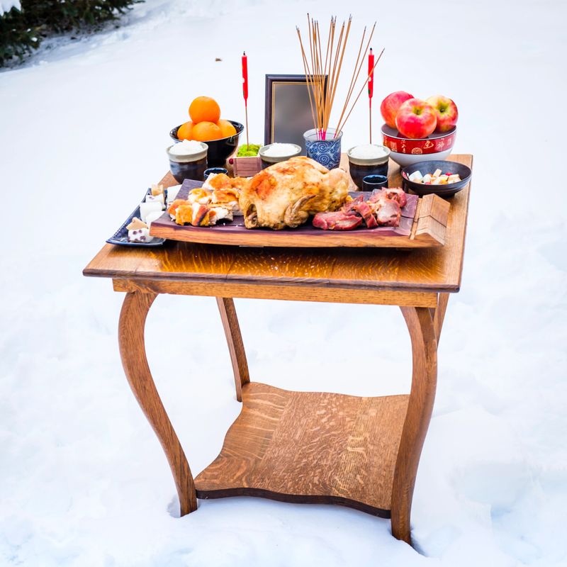 Bai Sun Offerings. This a traditional Chinese ceremony of prayer and offerings to the loved one that has passed away. A table set with foods and drinks