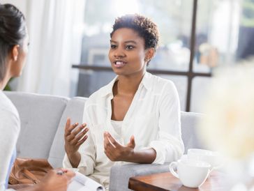 Professional woman engaged in a counseling session.