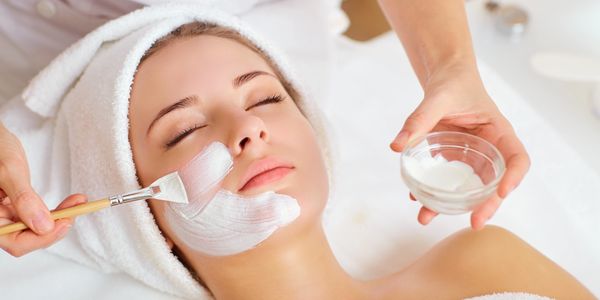 Milady facial with students learning how to apply various techniques. 