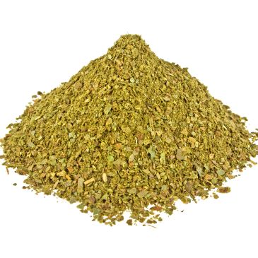 Pile of loose dried green herbs or spices.
