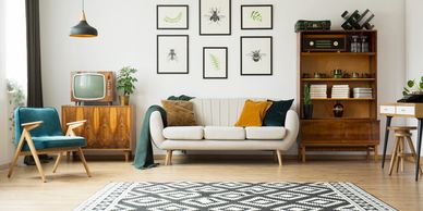 Gallery wall art installation in Tampa Bay home