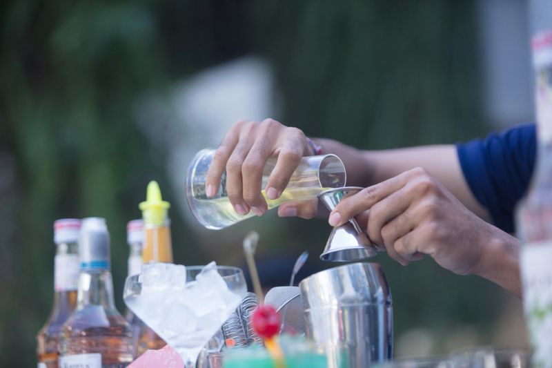 Bartender mixing cocktail