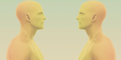 Two abstract humanoid figures facing each other.