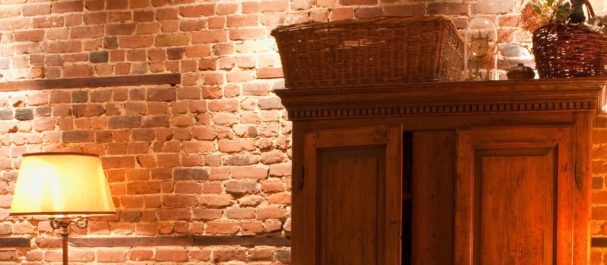 Restoration experts working on antique furniture.