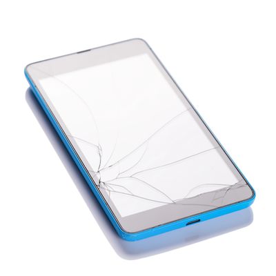 Blue smartphone with a severely cracked screen on white background.